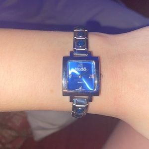 silver and blue diamond watch